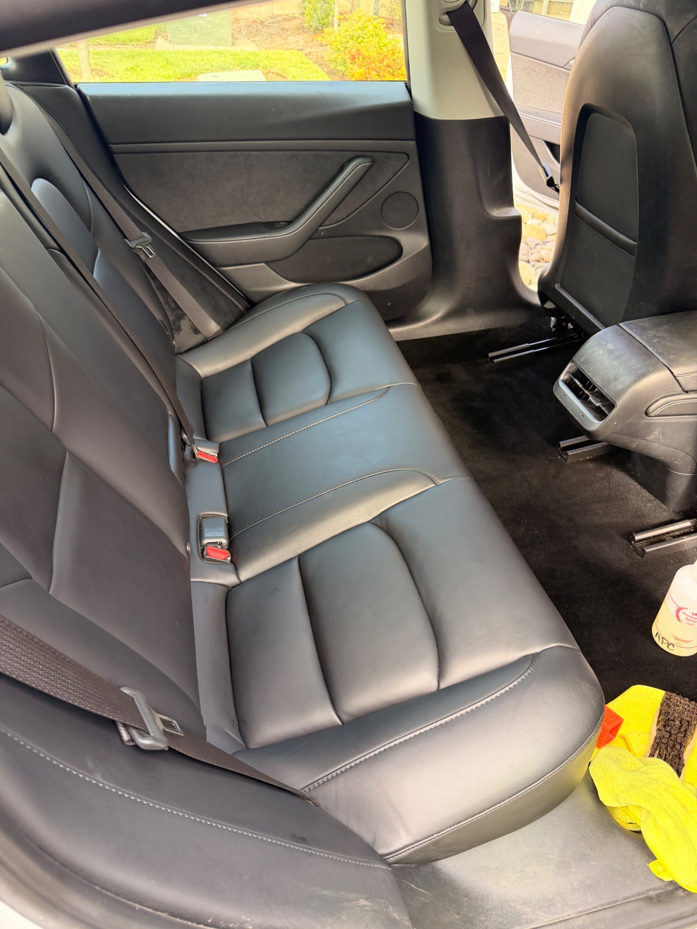 Same rear leather bench cleaned and conditioned after detailing